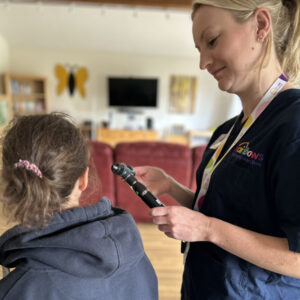 trainee acp using ostoscope bought by hospice aid uk at rainbow's hospice uk