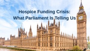 A photograph of the Houses of Parliament against a blue sky with clouds. The words 'Hospice Funding Crisis: What Parliament is Telling Us' are overlaid on the sky.