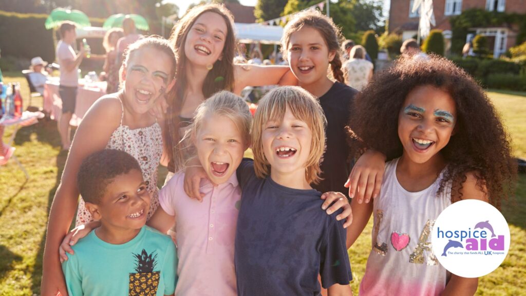 Group of children in the sunshine fundraising for charity